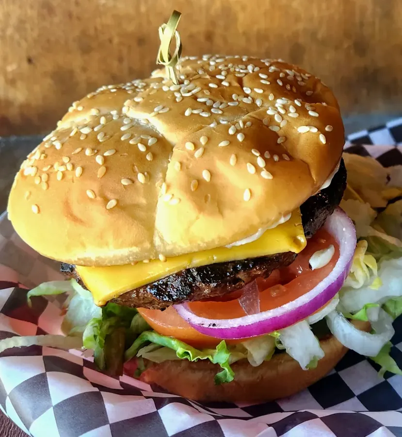 A cheeseburger on a checkered liner at Cassity’s Bar & Grill on Century Drive in Bend