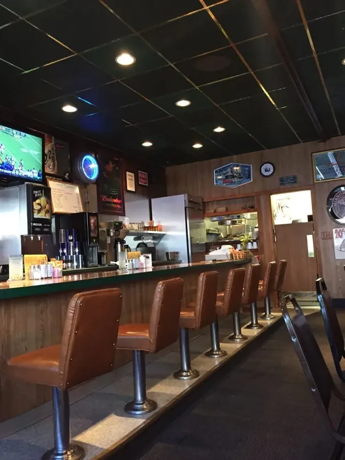 The bar and stools inside Corey’s Bar & Grill on Bond Street in downtown Bend