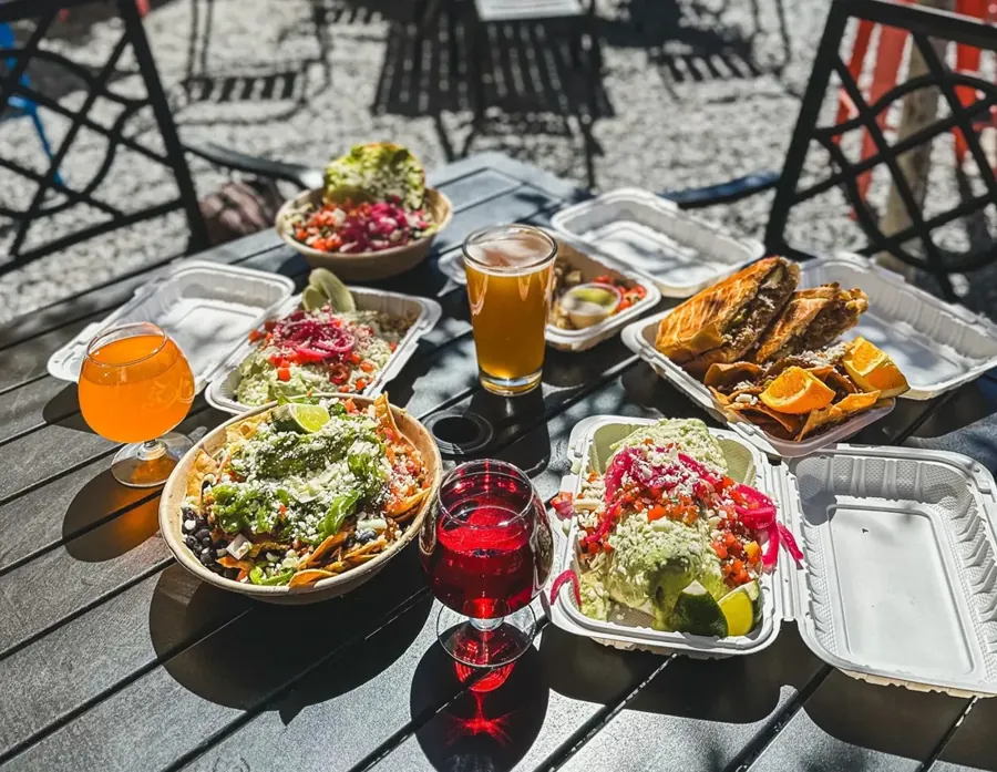 Tacos, bowls and drinks from Barrio, the anchor food cart at Midtown Yacht Club in Bend