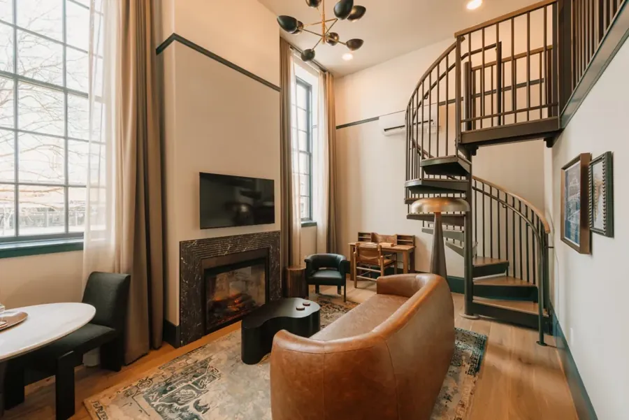 The fireside lounge and spiral staircase at Minnie’s in The Westman Hotel, downtown Bend
