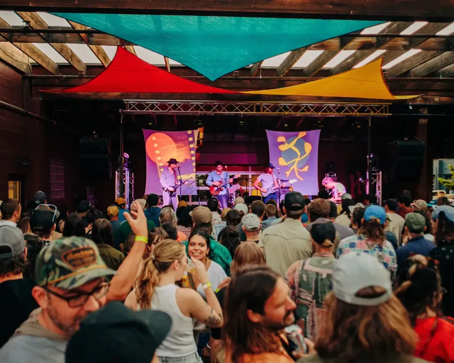 A crowd watching a band on stage at Volcanic Theatre Pub in Bend