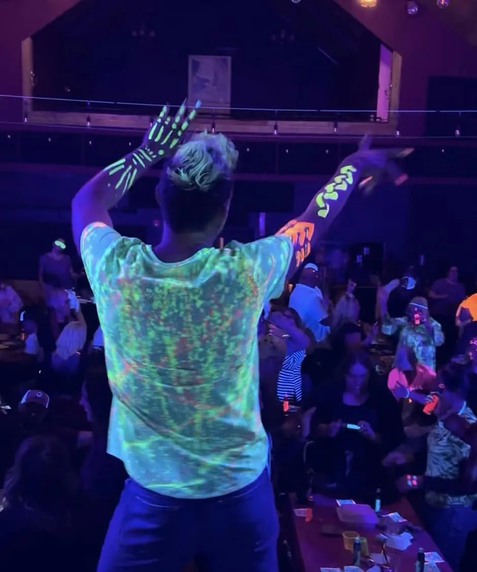 Glowing players at Blacklight Bingo