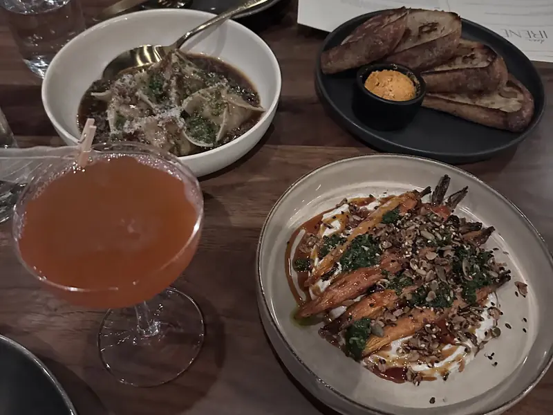 Shared plates and a cocktail at a Bend restaurant