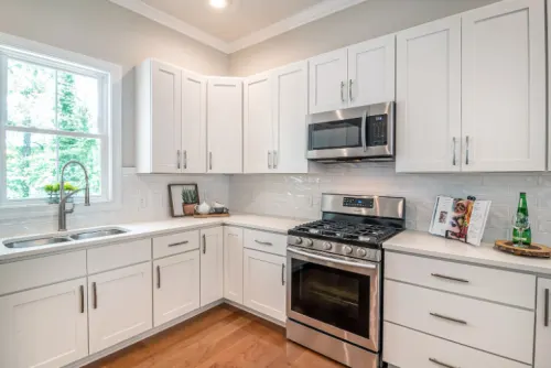 A white painted kitchen by Diego & Co