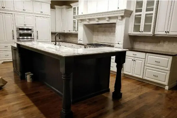 A kitchen with refinished cabinets by LIME Painting