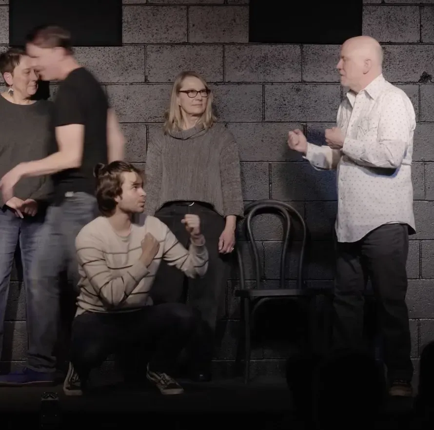 Improvisers performing on stage at the Bend Institute of Comedy