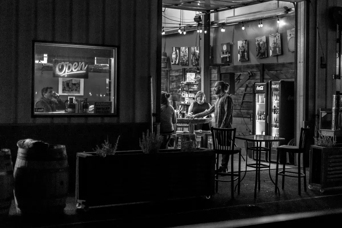 The dim, cozy bar at Craft Kitchen and Brewery in Bend
