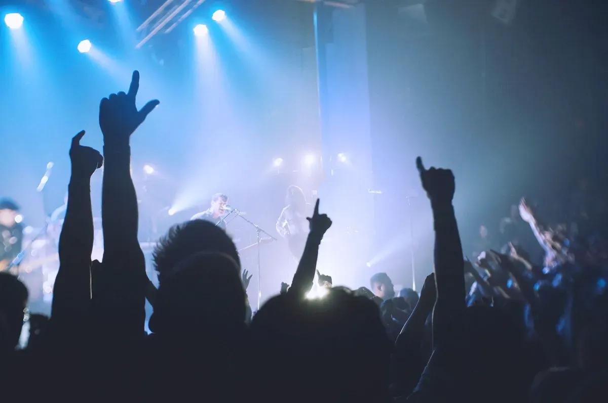 A crowd with phones up at a Midtown Ballroom show