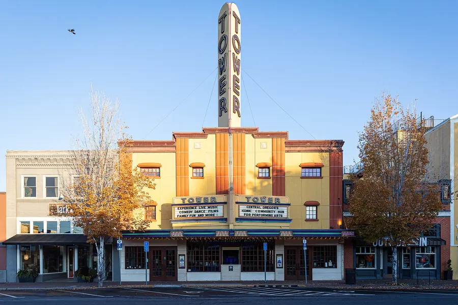 The Tower Theatre marquee on Wall Street in downtown Bend on a clear autumn day
