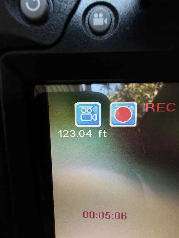 Sewer camera monitor showing 123.04 feet of line scoped