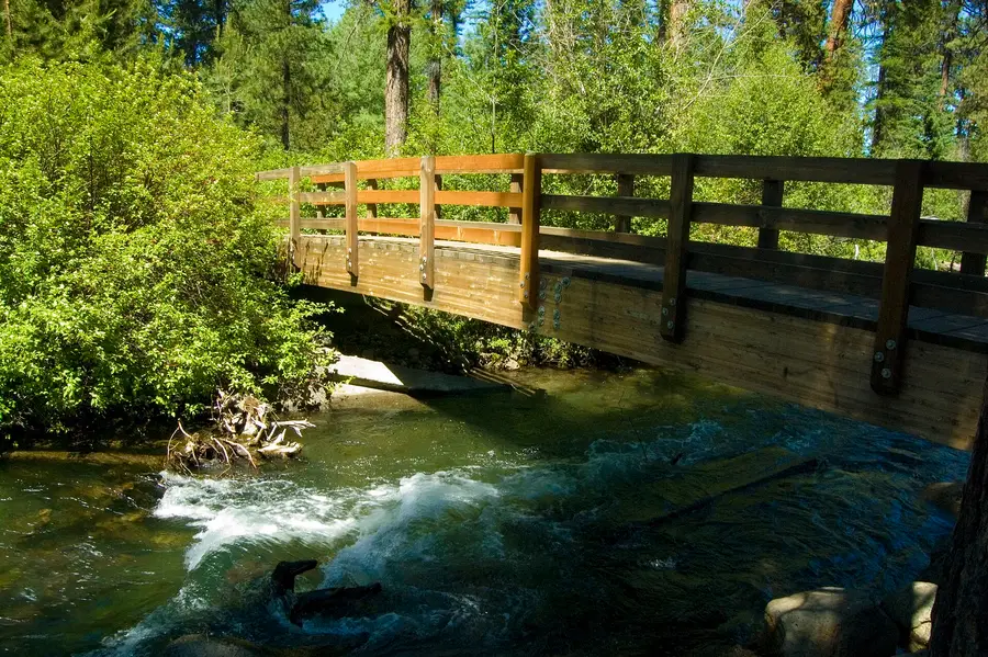 A wooden bridge over Tumalo Creek in Shevlin Park