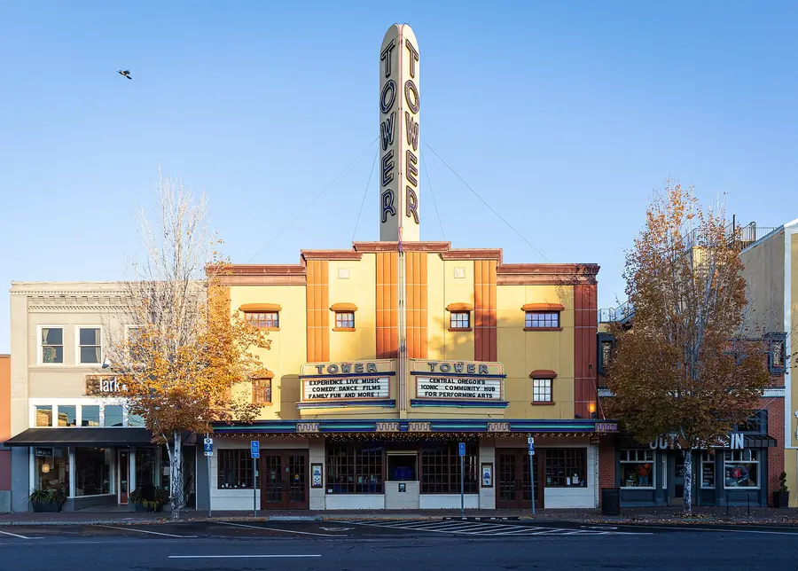 The Tower Theatre marquee and fall trees on Wall Street in downtown Bend