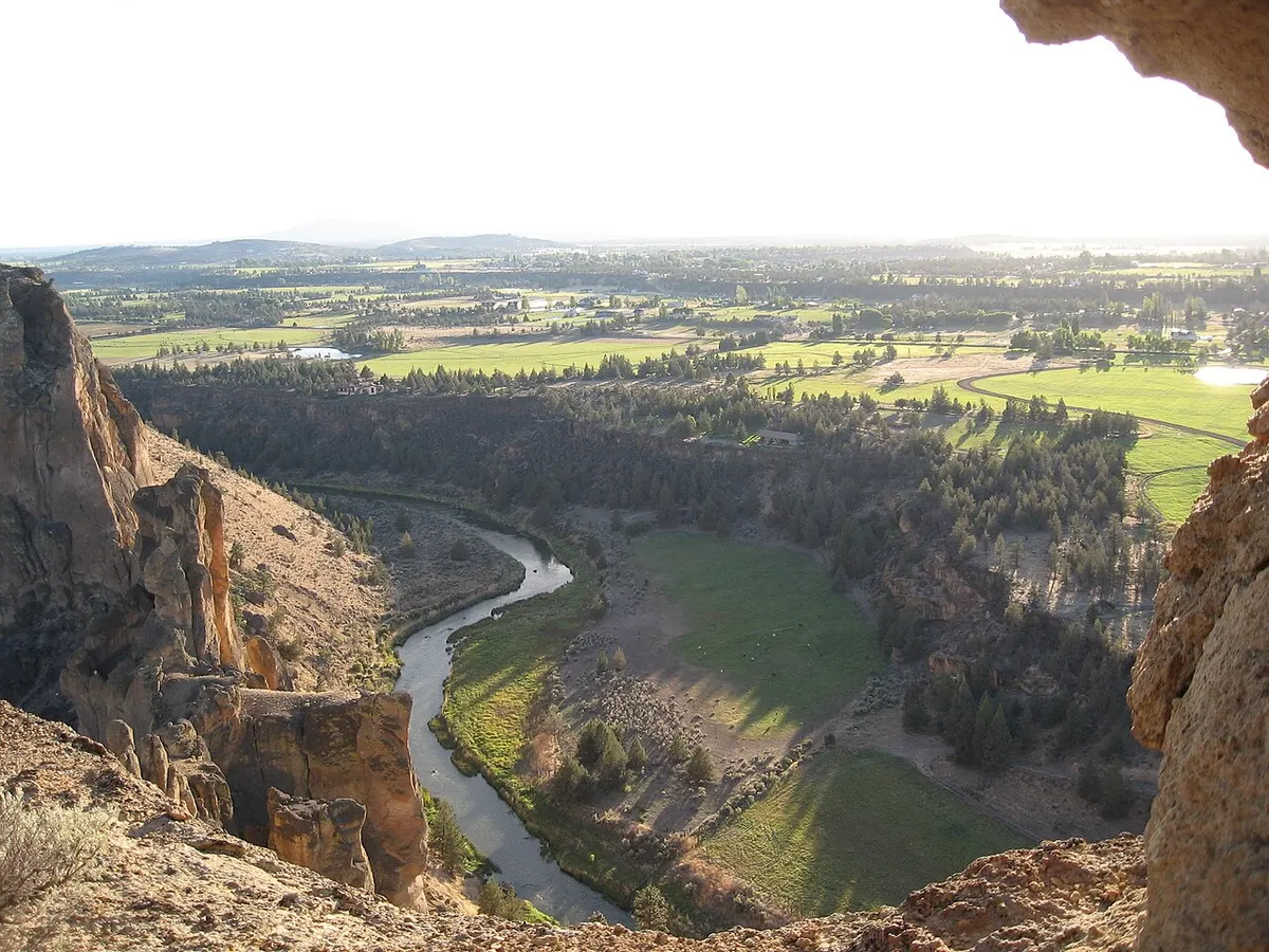 The Crooked River winding below Smith Rock with farmland beyond, near Terrebonne