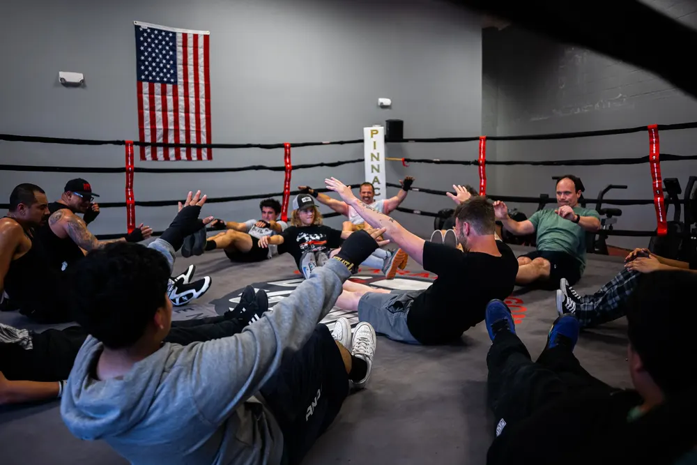 A class stretching in the ring at Central Oregon Boxing