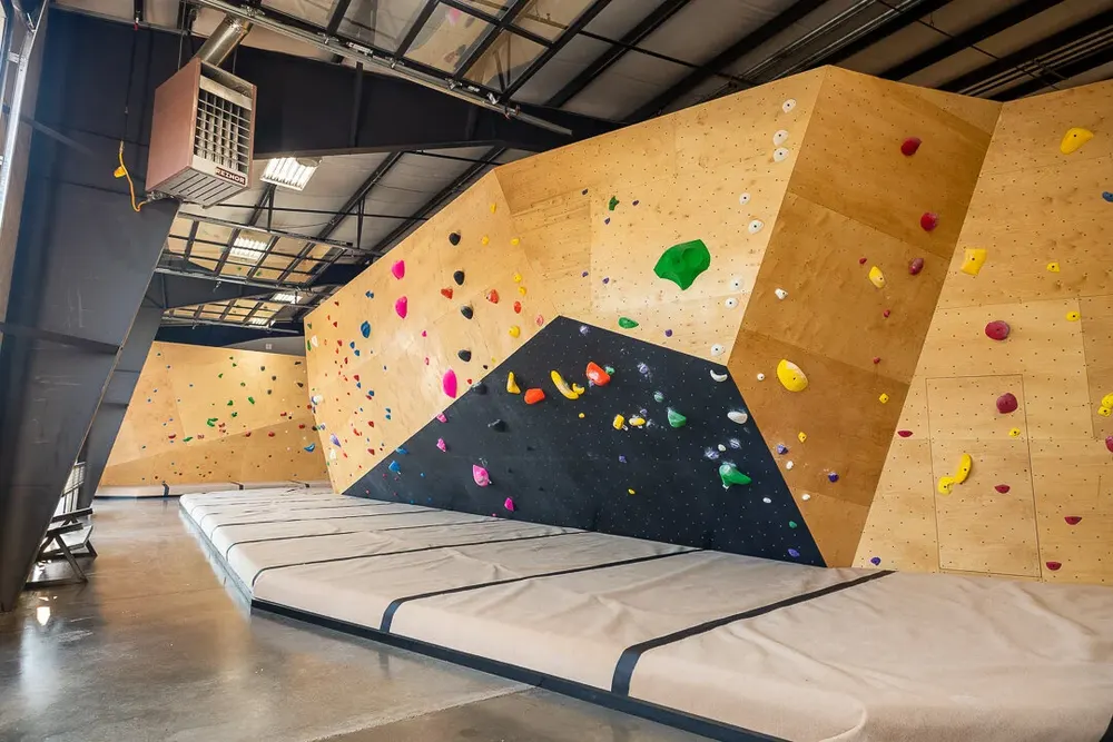 Bouldering walls and padded floor at The Circuit in Bend