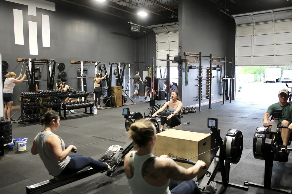 Racks and rowers inside The House gym