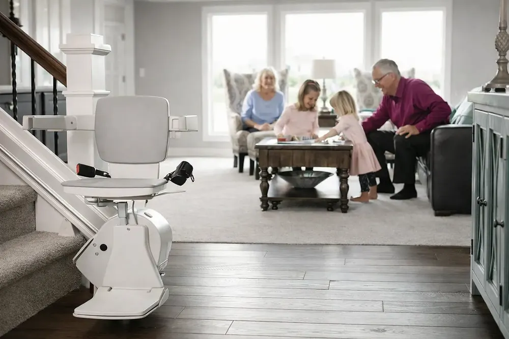 A stair lift installed on a staircase next to a living room