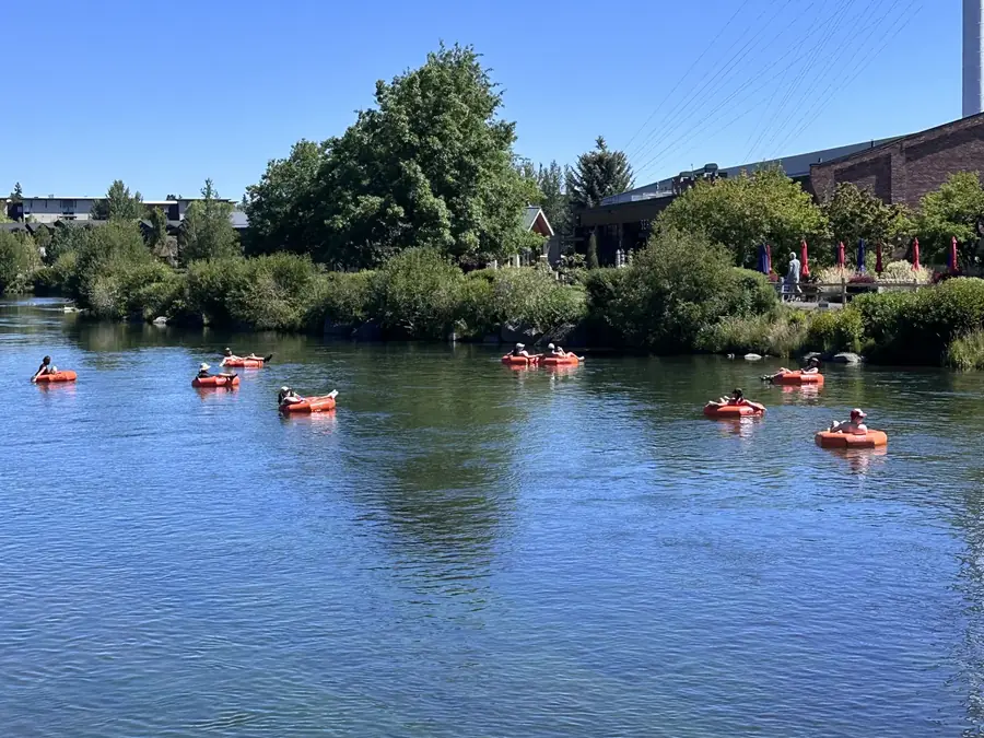 People floating the Deschutes River in Bend, Oregon