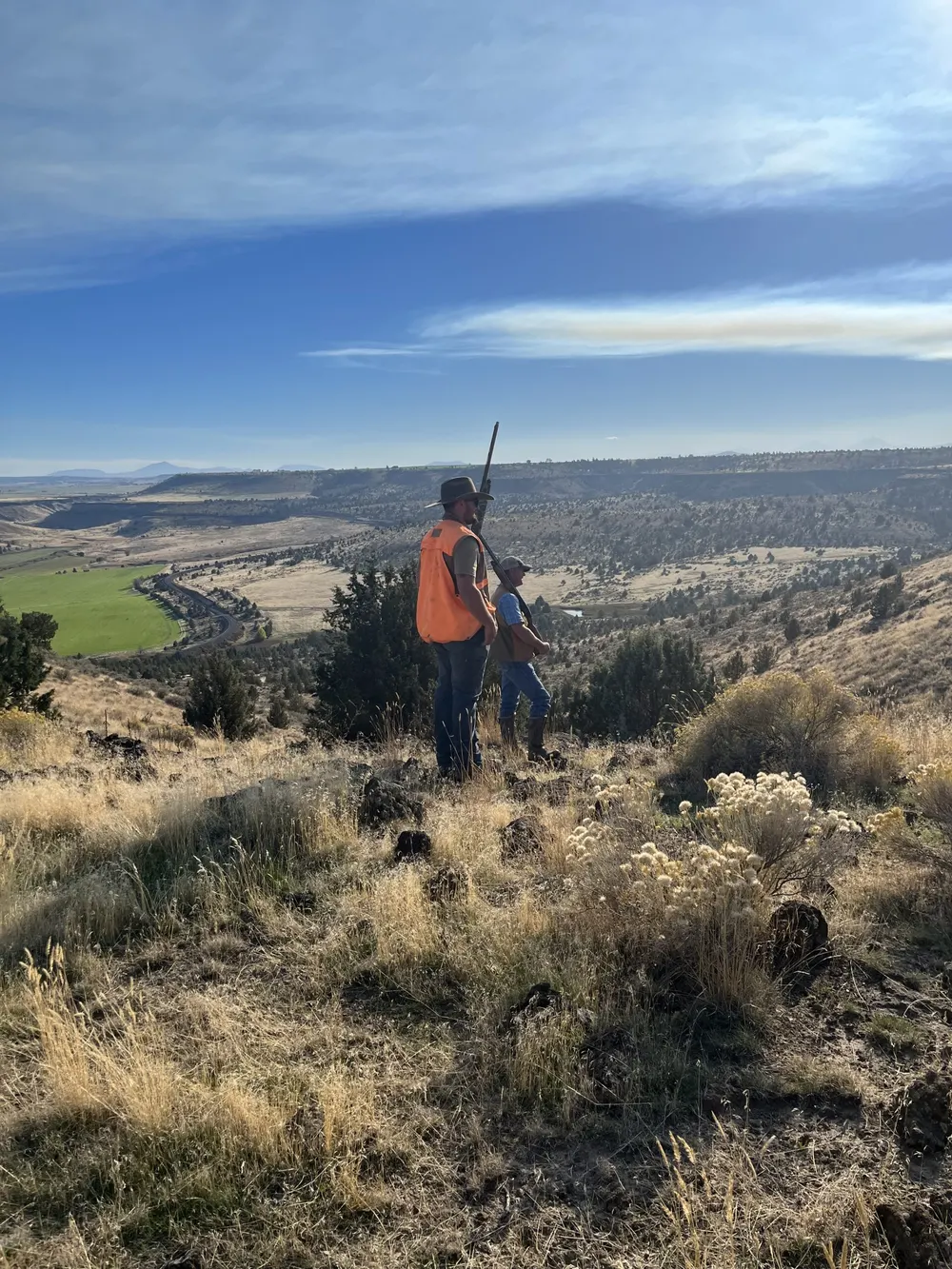 A hunter overlooking the canyon at Gateway Canyon Preserve near Madras