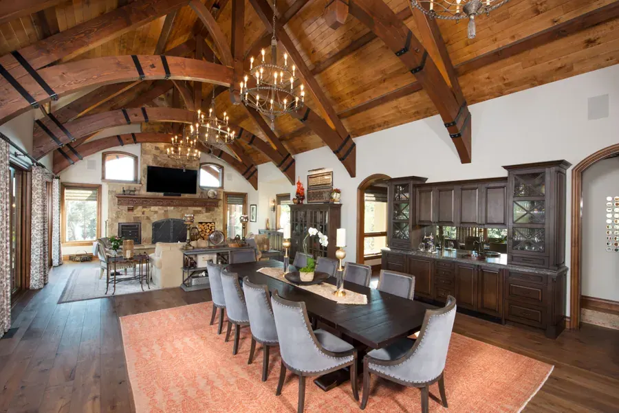 A vaulted timber great room and kitchen designed by Kirsti Wolfe Designs in Bend