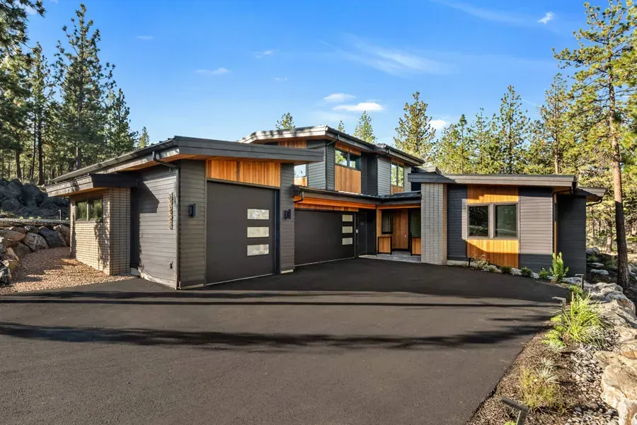 A modern custom home among pines designed by Vellum Design Studio in Bend