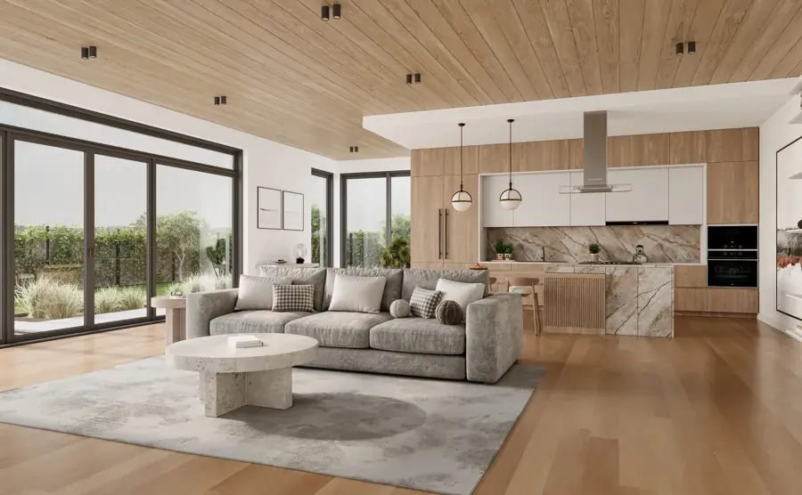 A modern great room with a wood ceiling and long kitchen by Village Interiors
