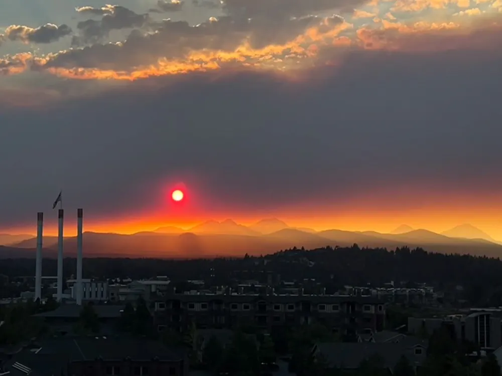 Sunset over Bend with the Old Mill smokestacks