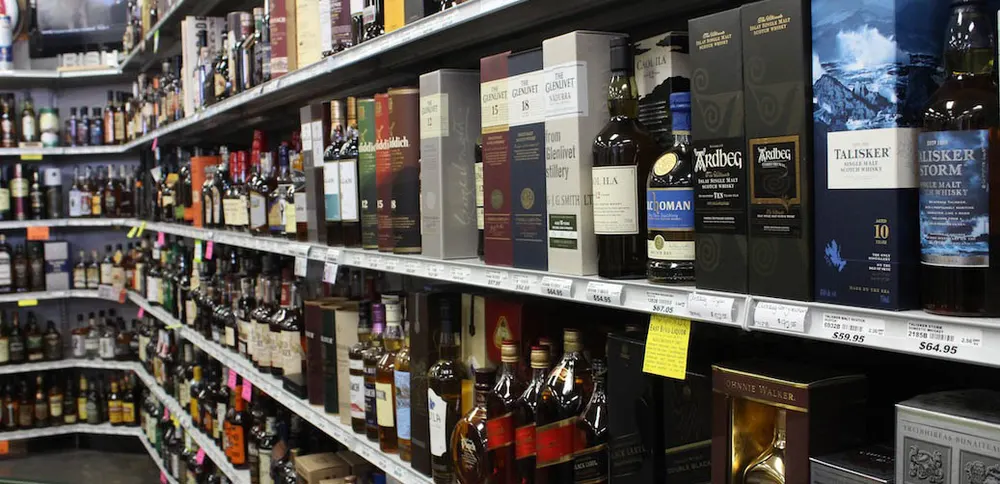 Shelves of Scotch whisky at East Bend Liquor