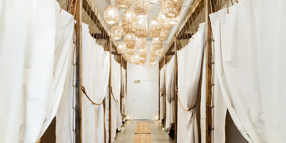 The curtained massage suites at The NOW