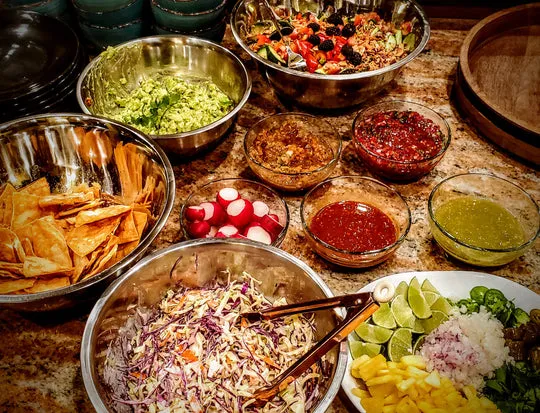 Bowls of fresh salads and toppings from Fire Fare Food Services