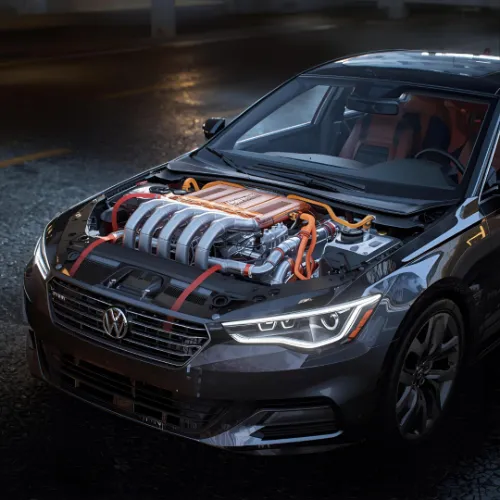 An open engine bay on a dark car
