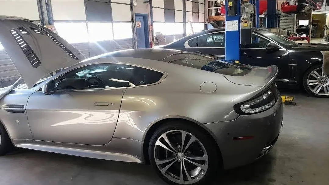 An Aston Martin in the service bay at Chuck's Auto Shop