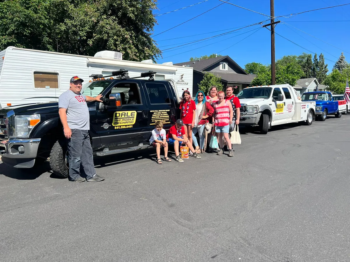 Dale the Mobile Mechanic crew with their service trucks