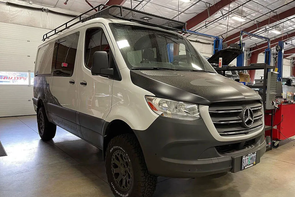 A Mercedes Sprinter van in a service bay at Import Performance in Bend