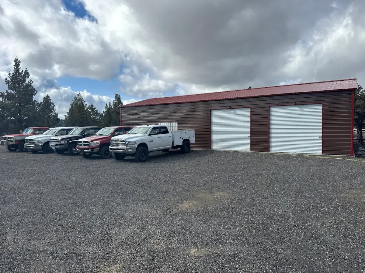 The Murry's Diesel shop building with trucks parked outside
