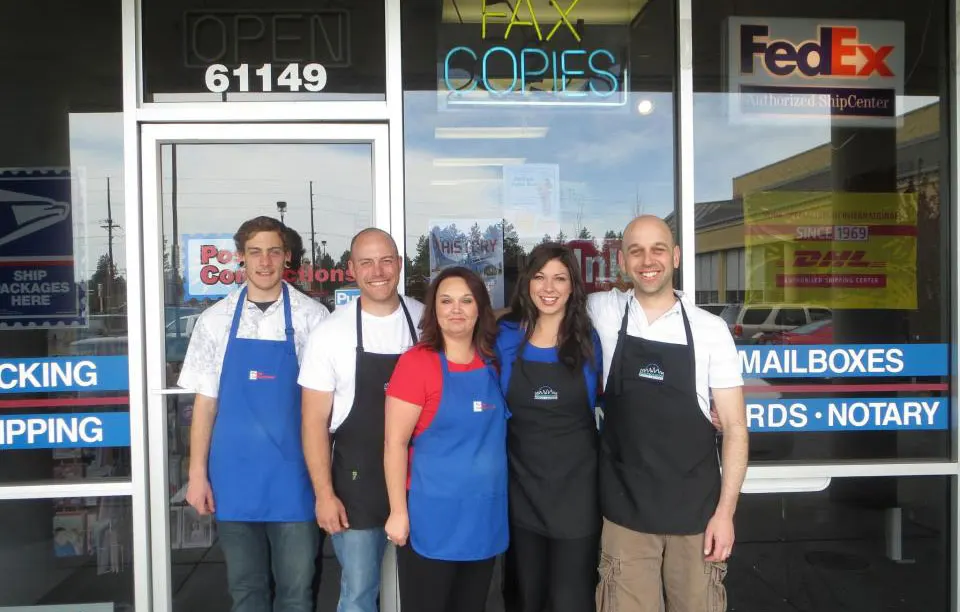 Postal Connections 108 staff in front of the Bend store