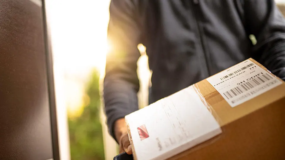 Package being handed over at a UPS Store