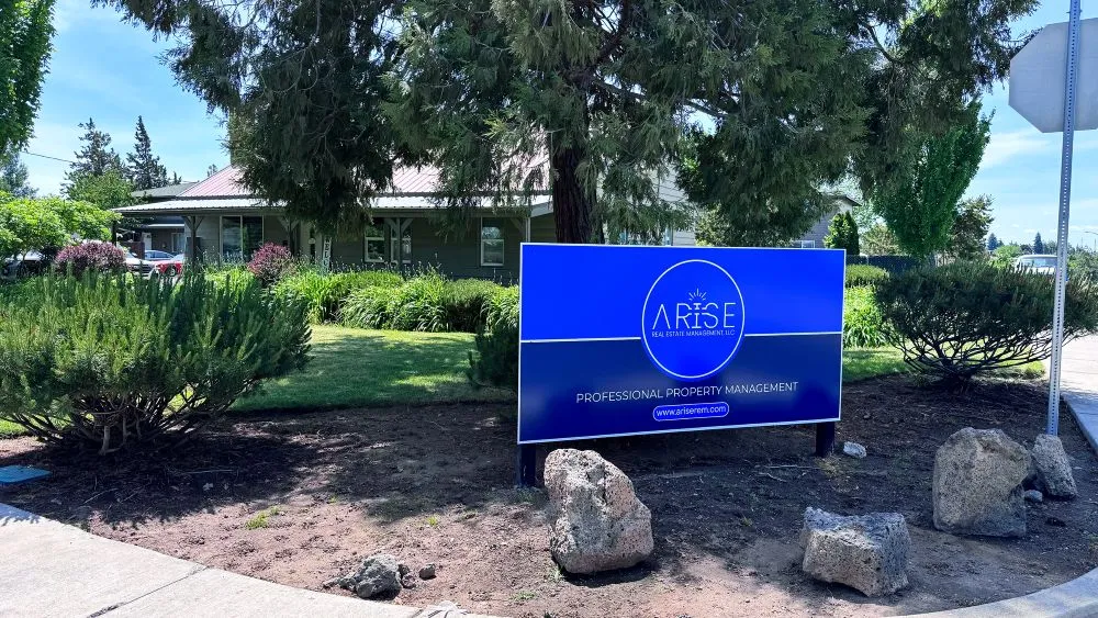 The Arise Real Estate Management sign outside its office