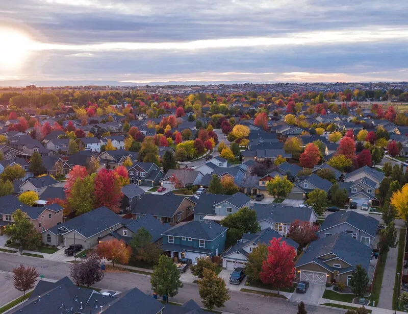 Aerial view of a Central Oregon neighborhood in fall color, from RealWise Property Management