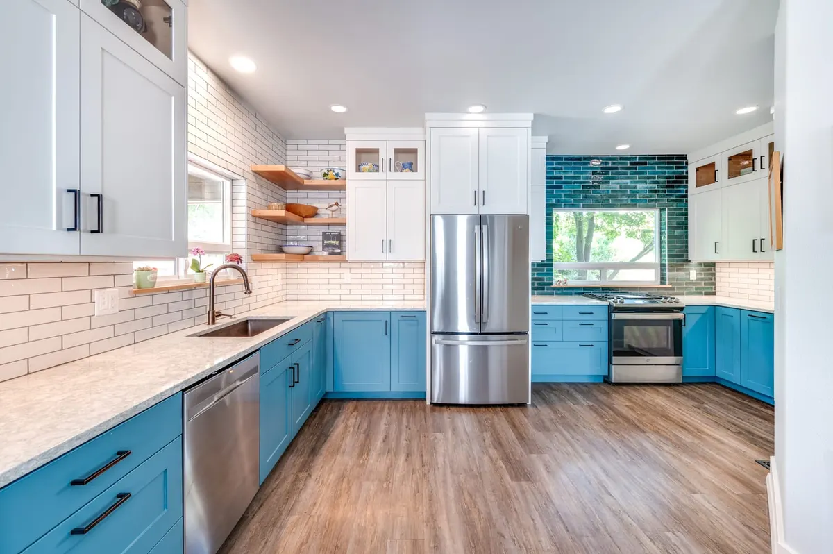 Remodeled kitchen with turquoise lower cabinets and open shelves on NW 11th St by Branch Brothers