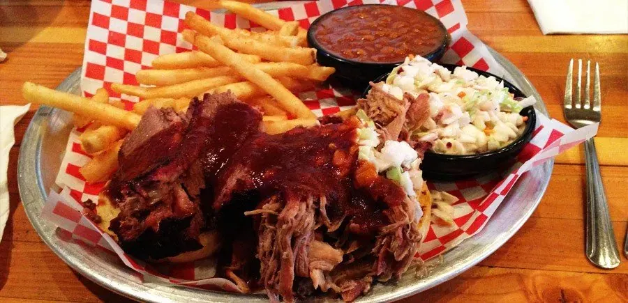 A basket of pulled pork, ribs, fries and slaw at Baldy’s Barbeque in Bend