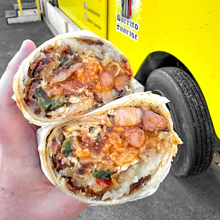 A Burrito Sunrise burrito cut in half