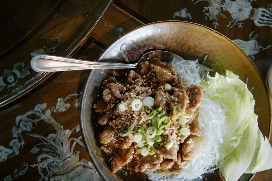 A rice bowl with pork and cabbage at Chi Chinese & Sushi Bar in Bend