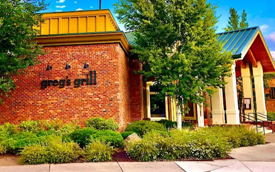 The brick and timber entrance to Greg’s Grill in the Old Mill District, Bend