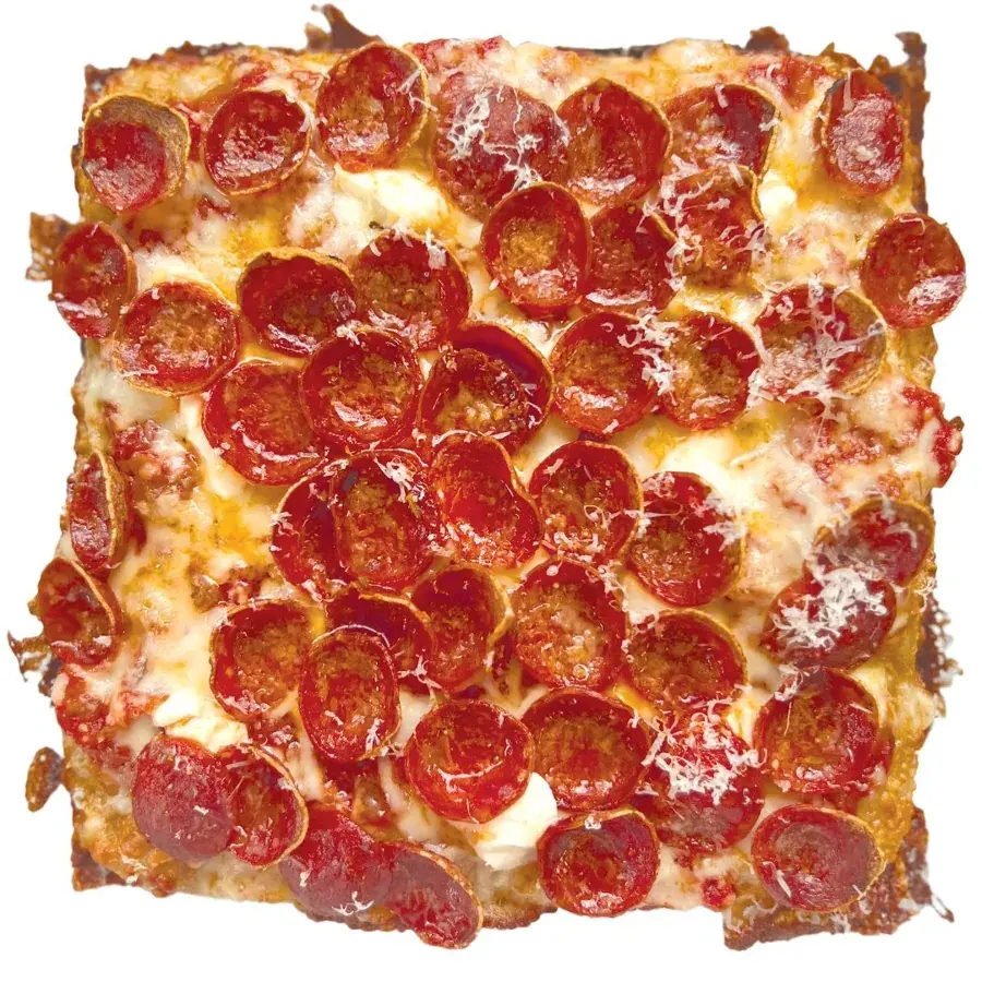 A Kitchen Window pan pizza with cupped pepperoni