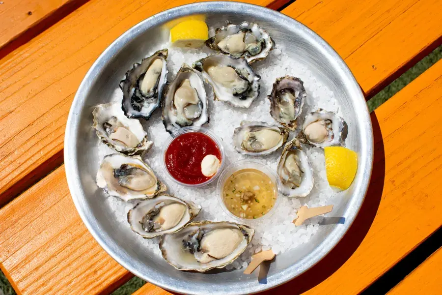 A platter of raw oysters on ice at the Mother Shuckers cart at The Podski in Bend
