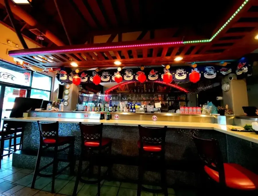 The sushi bar with red lanterns at Sora Sushi in downtown Bend