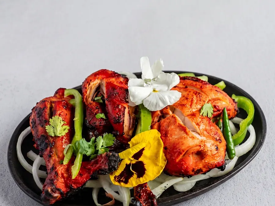 Tandoori chicken with peppers and onions at Spiceland Indian restaurant in downtown Bend