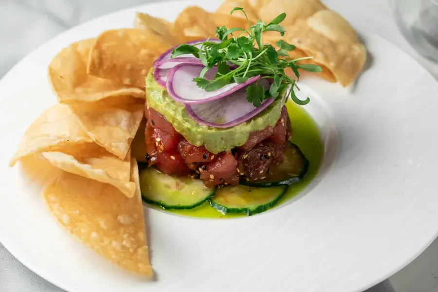 A tuna tower with avocado and wonton chips at The Hook & Plow on Century Drive in Bend