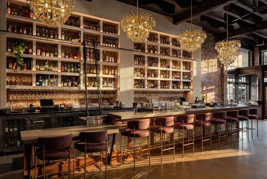 The bar and back shelves at The Hudson, a live-fire steakhouse at 900 NW Wall Street in Bend